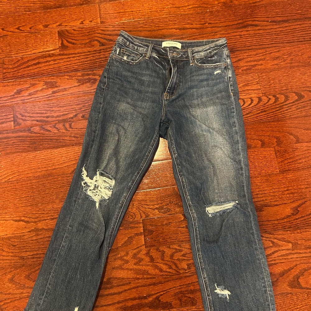 Distressed Blue Jeans